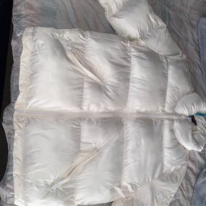 A junior Large Cream coat never worn ..